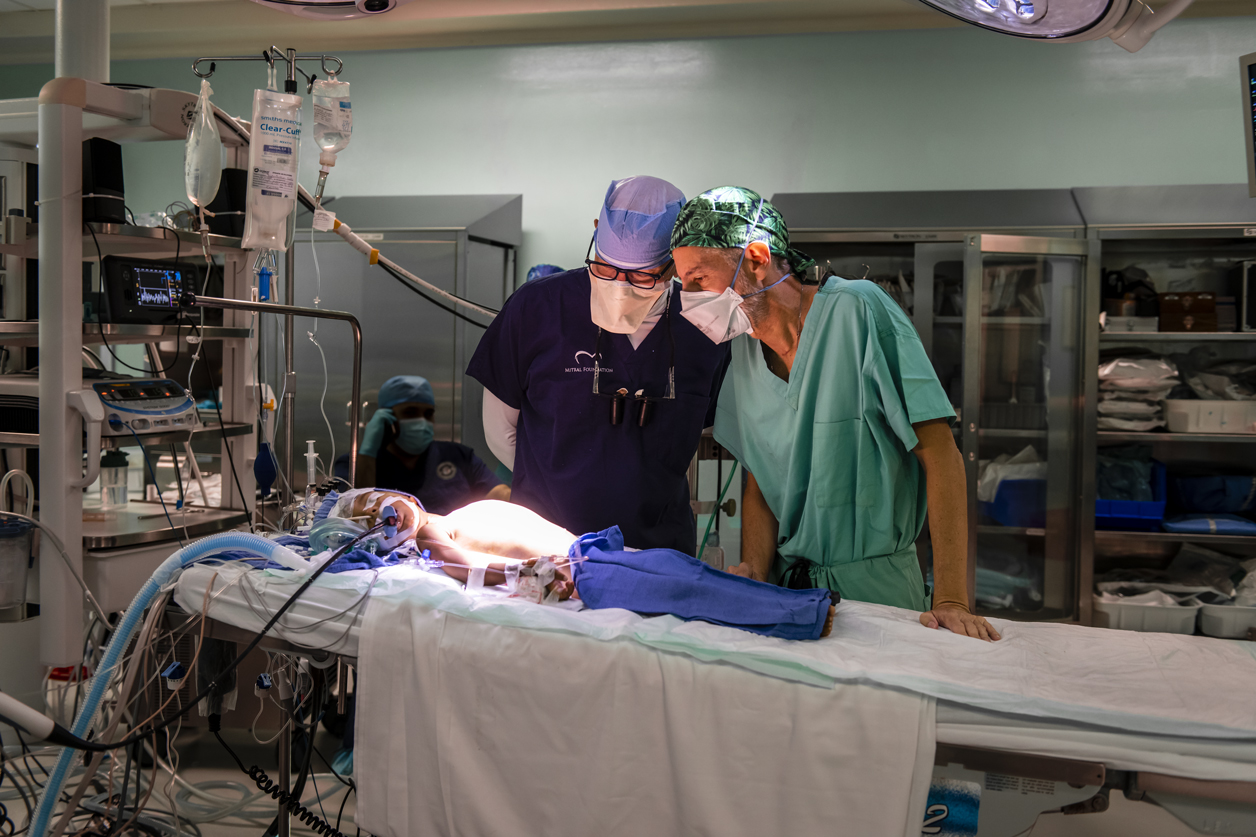 Dr. Adams and Dr. Juan Leon of CEDIMAT, in the Dominican Republic, discuss their surgical plan for one-year-old Yailin.