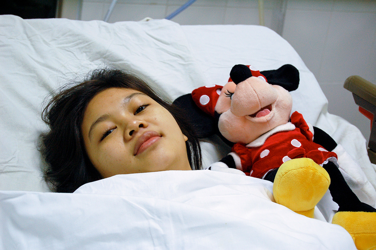 A young patient recovers after mitral valve repair surgery in Vietnam.
