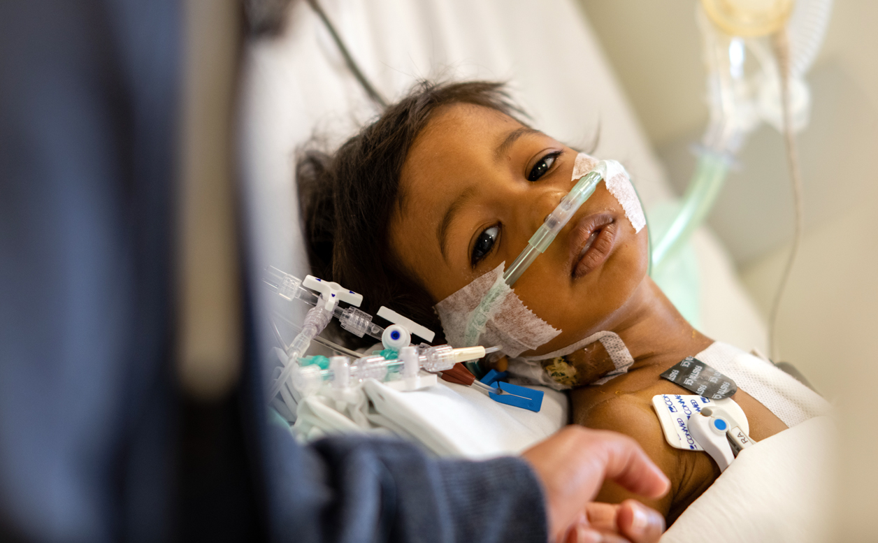 One-year-old Yailin recuperates after successful valve repair surgery in 2022.