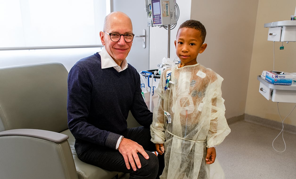 Dr. Adams with a mitral valve repair patient on a Children's Valve Project medical mission to the Dominican Republic.