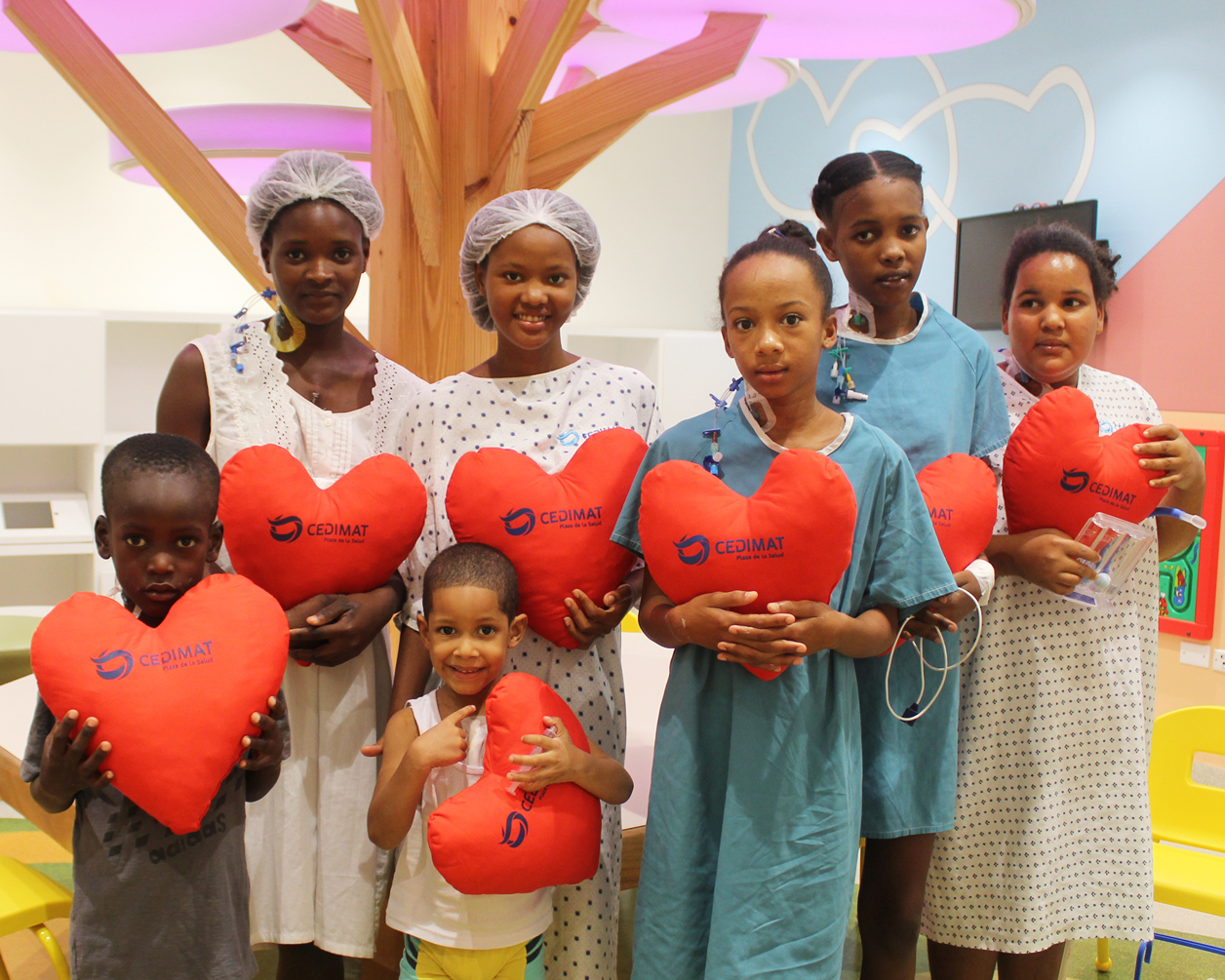 Woodmylens poses post-surgery with other young patients who had their mitral valves repaired during the July medical mission to the Dominican Republic. 